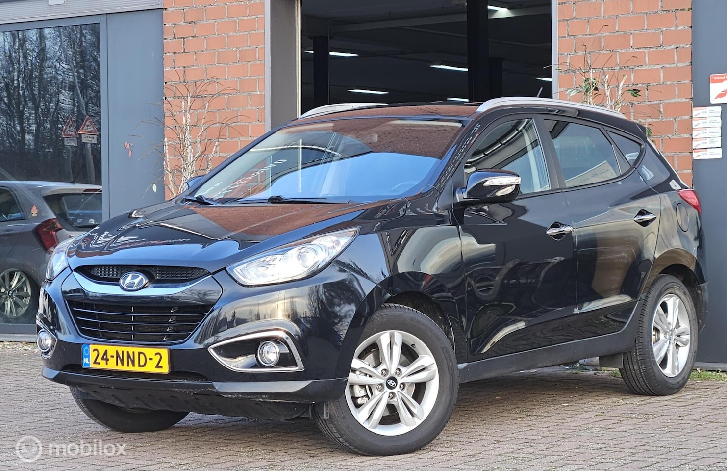 Hyundai ix35 - 2.0i Style Leer Airco Cruise controle nap 1e eigenaar - AutoWereld.nl