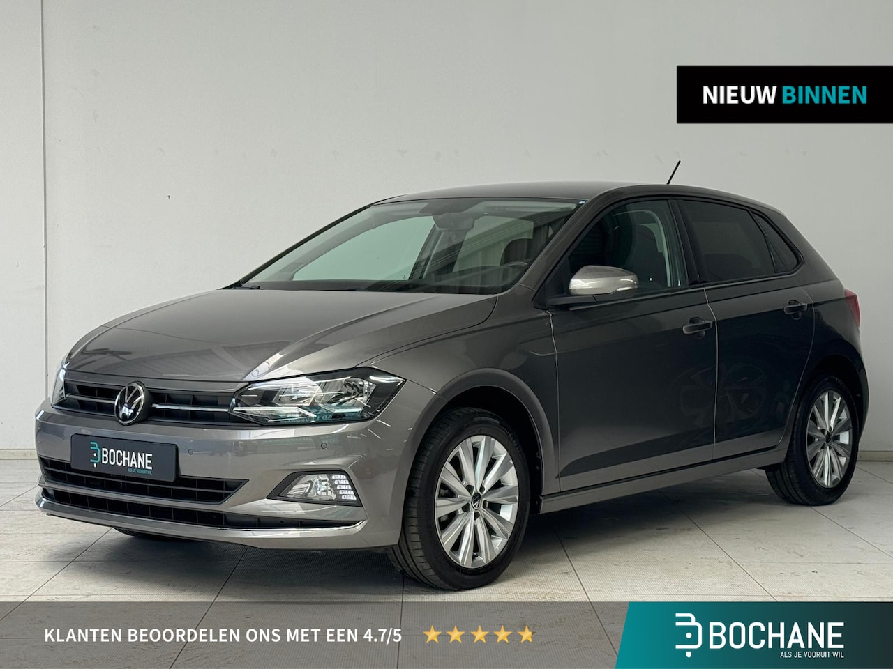 Volkswagen Polo - 1.0 TSI Highline | Navigatie | PDC V + A | Cruise control adaptief | Lichtmetalen velgen 1 - AutoWereld.nl
