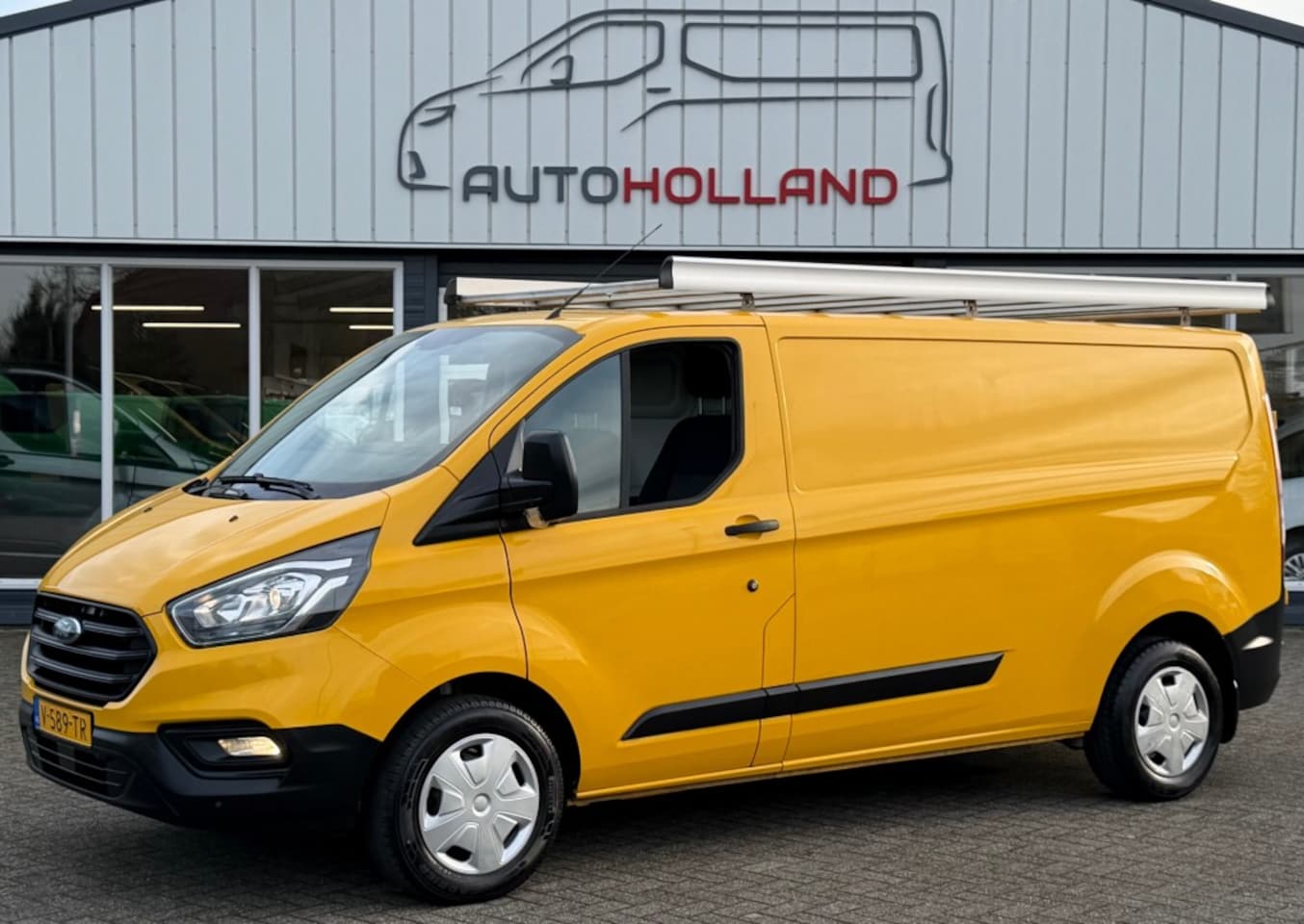 Ford Transit Custom - 2.0 TDCI 77KW 105PK L2H1 EURO 6 AIRCO/ CRUISE CONTROL/ IMPERIAAL/ TREKHAAK/ 100% DEALEROND - AutoWereld.nl