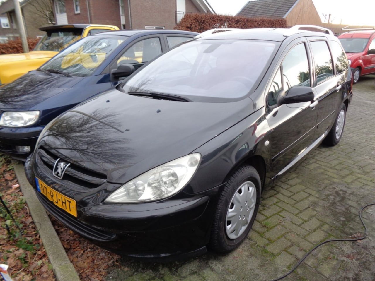 Peugeot 307 - 6-1-2027 a p k 7 persoons - AutoWereld.nl