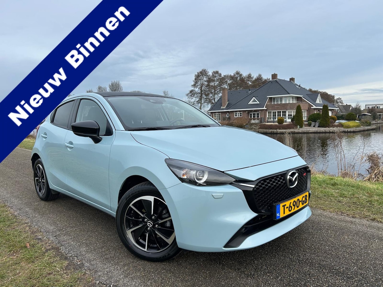 Mazda 2 - 1.5 e-SkyActiv-G 90 Homura Aka Leer/Alcantara / Stoelverwarming - AutoWereld.nl