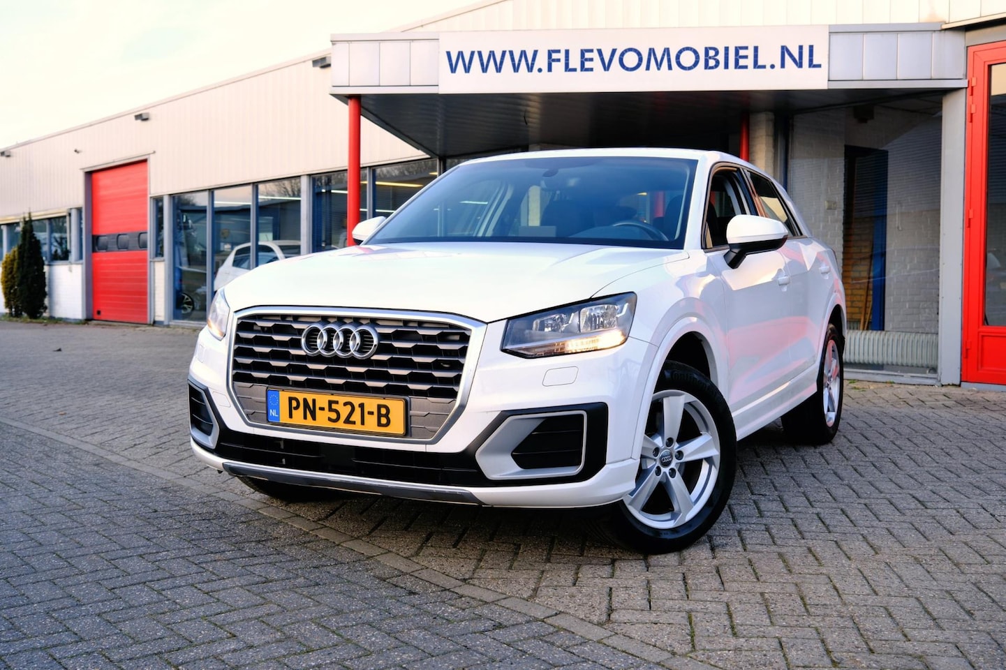 Audi Q2 - 1.0 TFSI Sport Aut. *11.452km!* Navi|1e Eig!|Clima|LMV - AutoWereld.nl