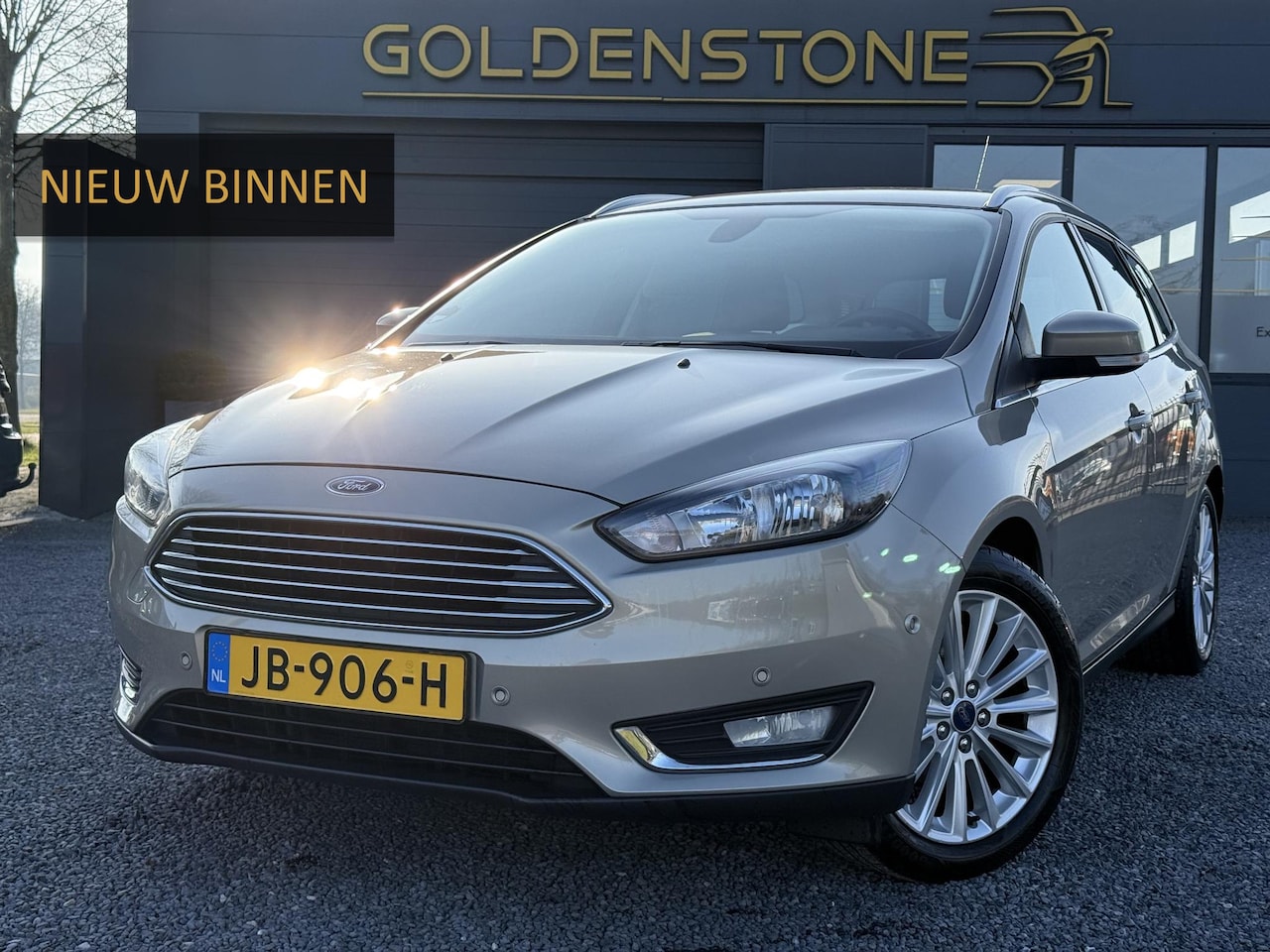 Ford Focus Wagon - 1.0 Titanium 1e Eigenaar,Navi,Trekhaak,Dealer Onderhouden,Clima,Cruise,Pdc V+A,125pk,N.A.P - AutoWereld.nl