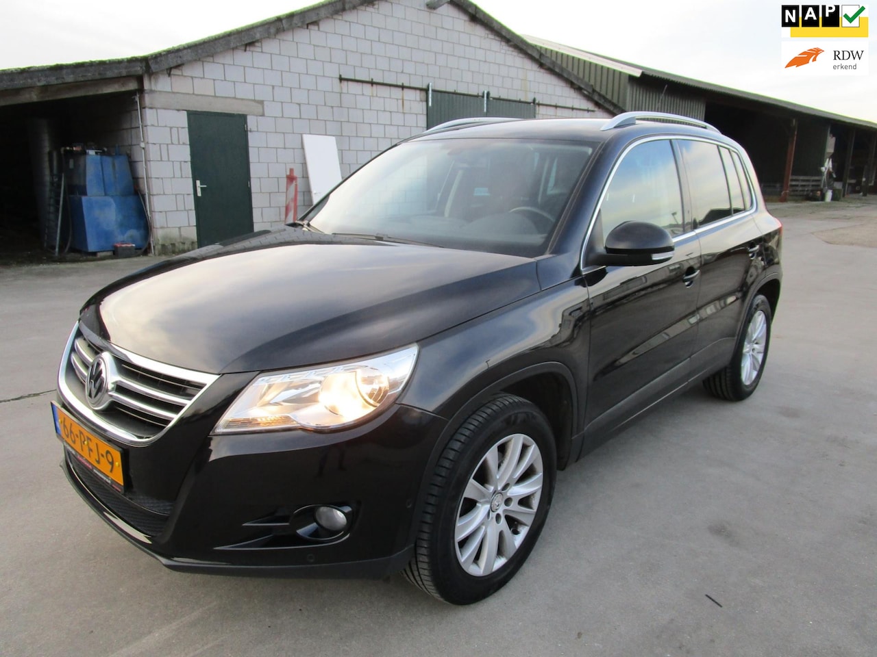 Volkswagen Tiguan - 1.4 TSI Sport&Style clima navi APK 2-2027 - AutoWereld.nl