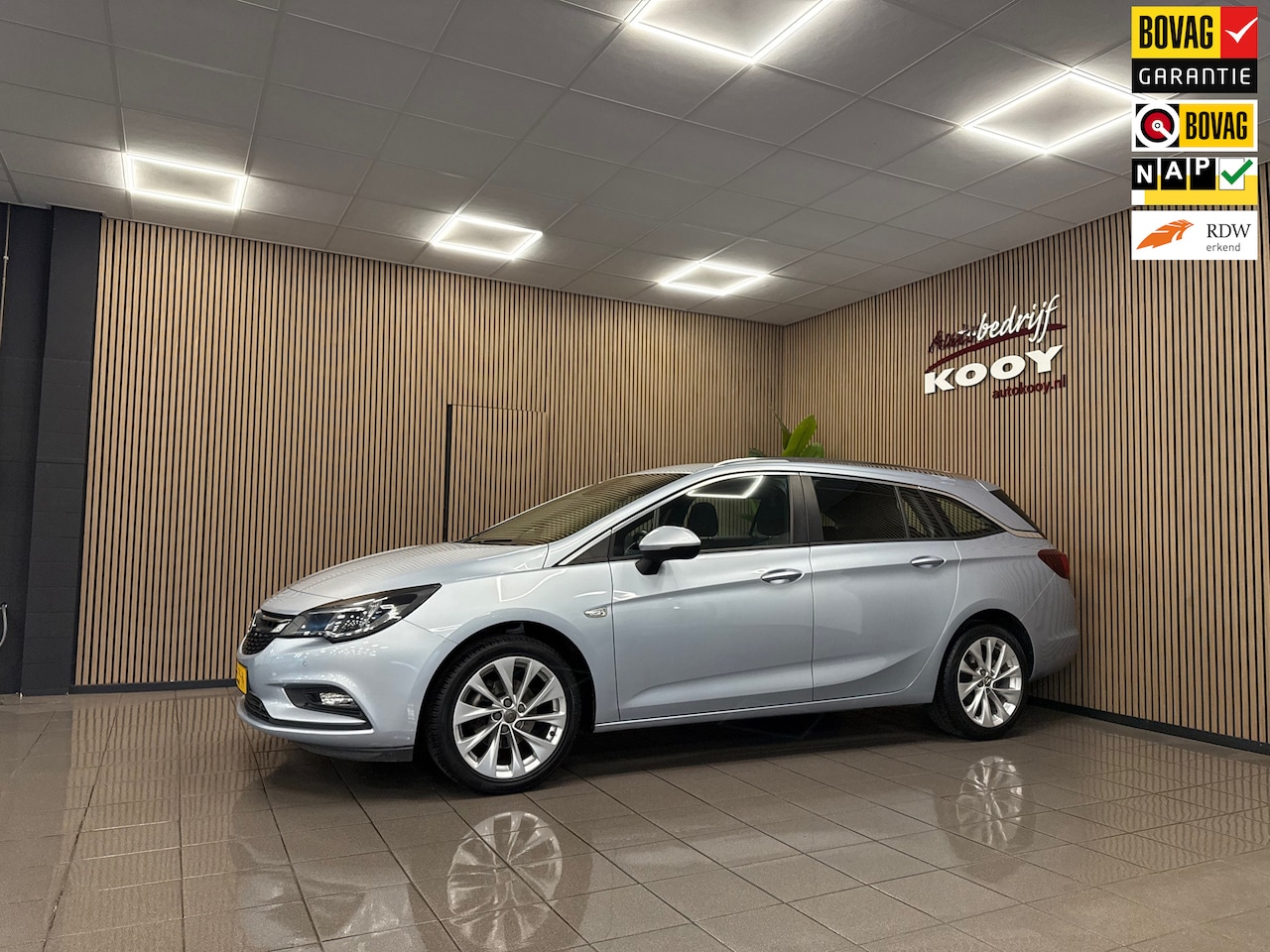 Opel Astra Sports Tourer - 1.0 Edition * Navigatie / Cruise control / Parkeersensoren / NL Auto * - AutoWereld.nl