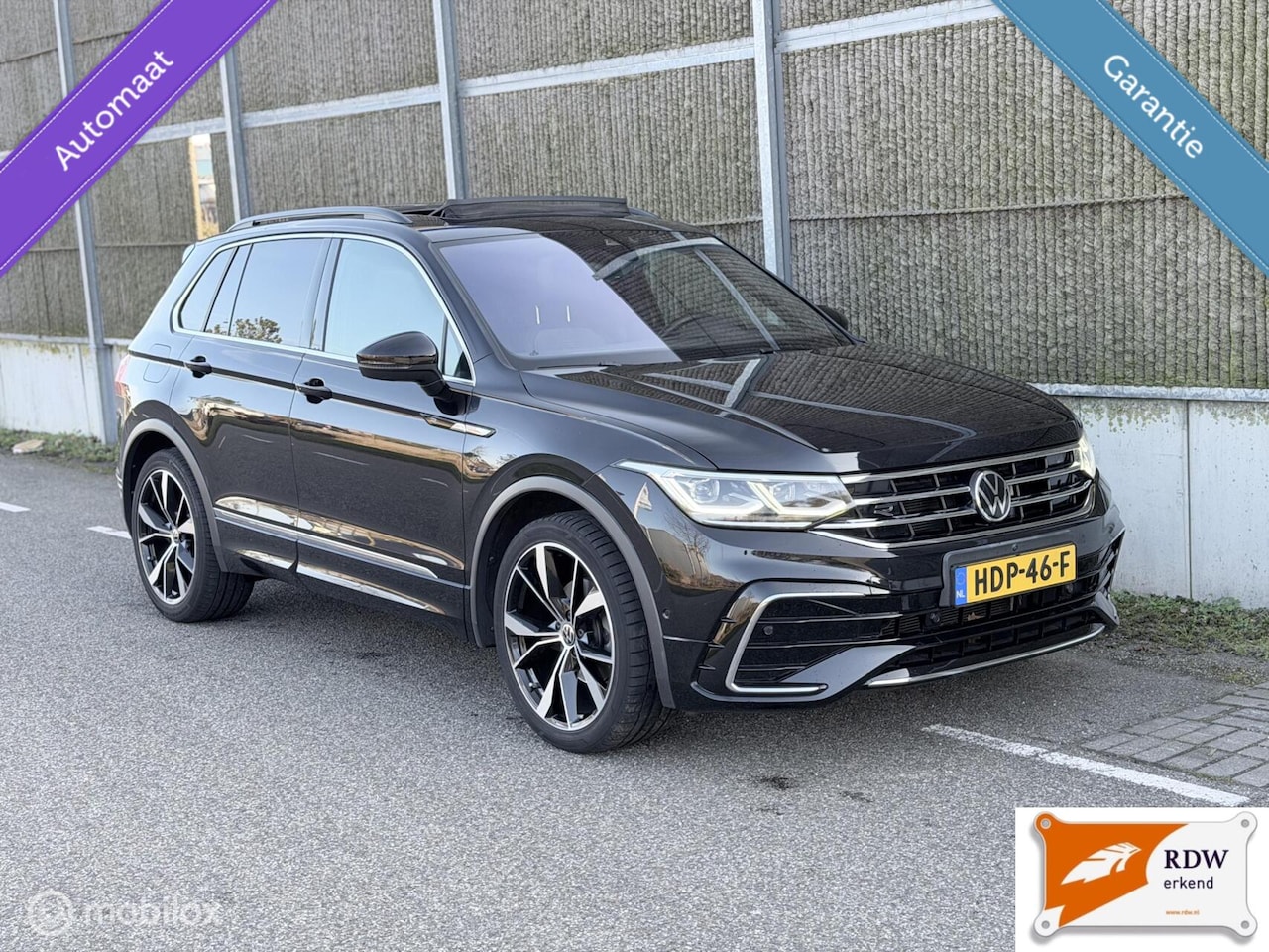 Volkswagen Tiguan - 1.5 TSI R-Line Business+ PANO/360•CAMERA - AutoWereld.nl