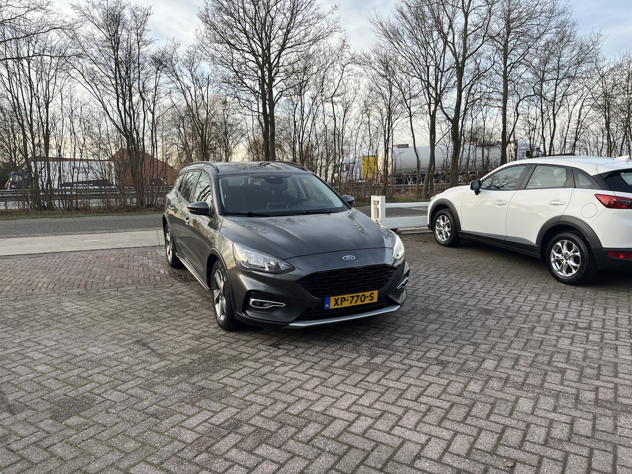 Ford Focus Wagon - 1.0 EcoBoost Active Business TREKHAAK WINTER PACK CRUISE - AutoWereld.nl
