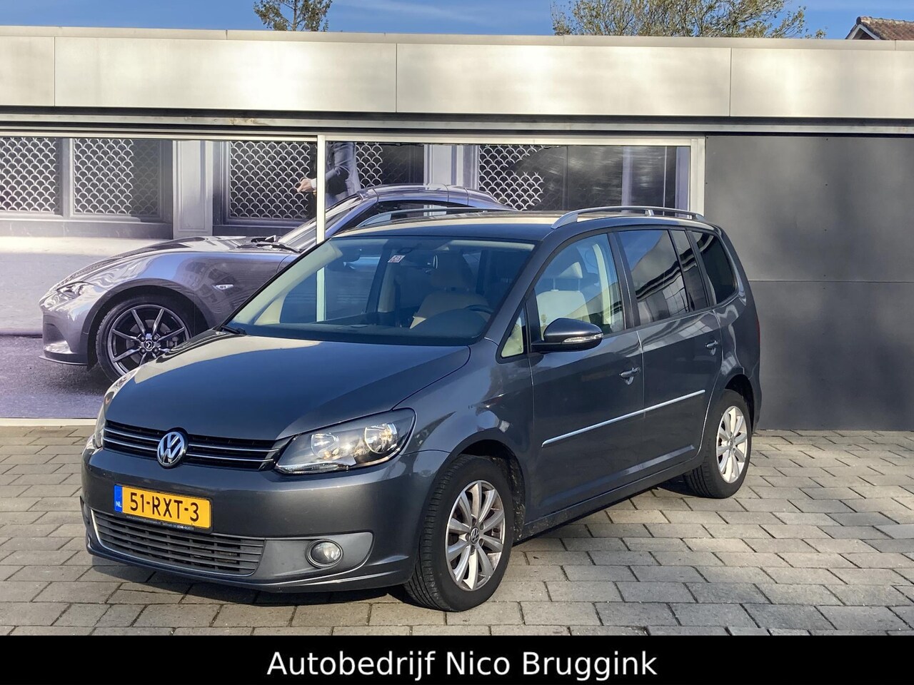 Volkswagen Touran - 1.2 TSI Highline BlueMotion *All-in prijs* - AutoWereld.nl