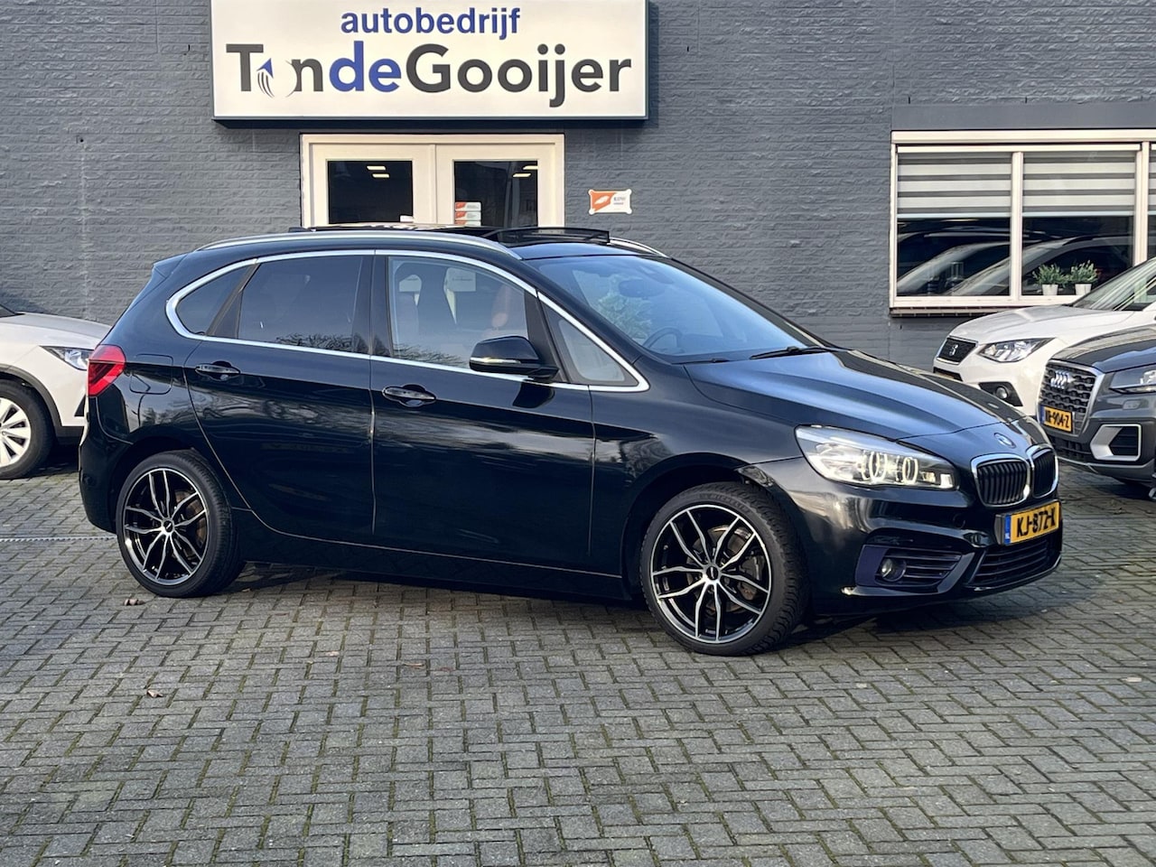 BMW 2-serie Active Tourer - 218i Aut. High Executive | LEER | GROOT NAV. | PANORAMADAK | - AutoWereld.nl
