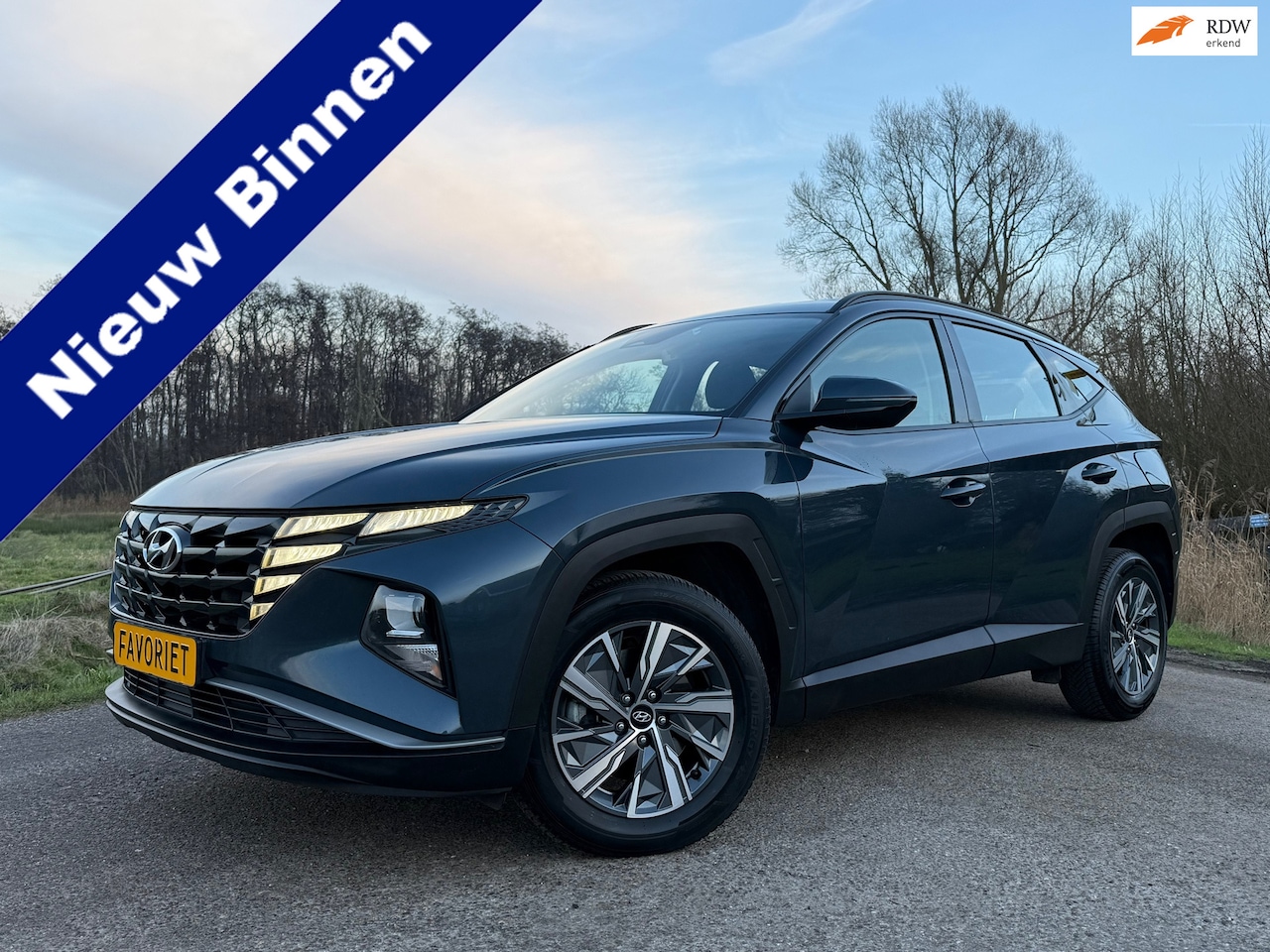 Hyundai Tucson - 1.6 T-GDI HEV 235 PK i-Motion Automaat / Camera / Apple CarPlay-Android Auto / Navi / Clim - AutoWereld.nl