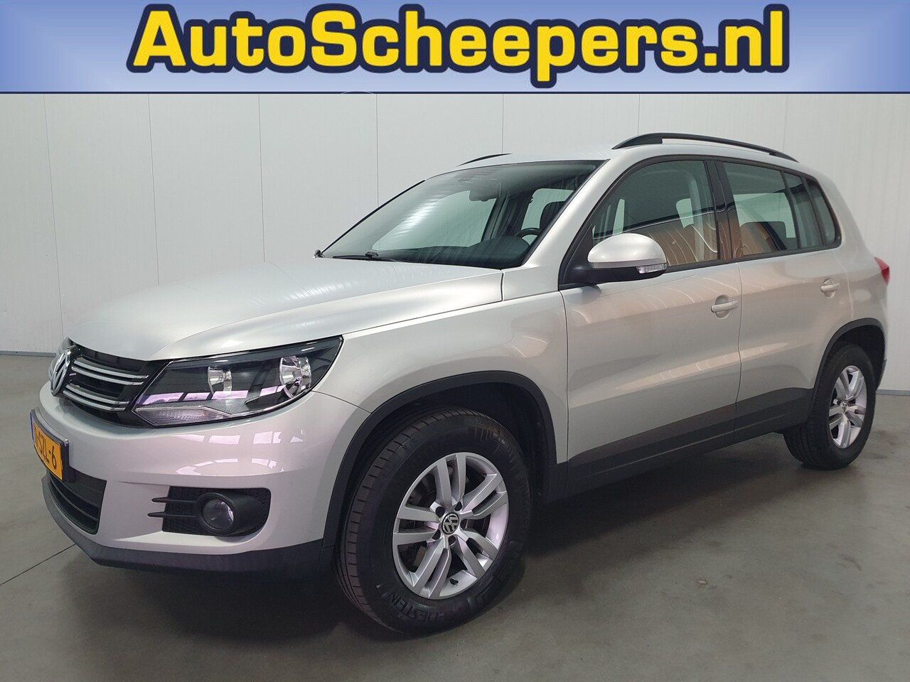 Volkswagen Tiguan - 1.4 TSI Comfort&Design AIRCO/TRHAAK/CRUISE/LMV - AutoWereld.nl