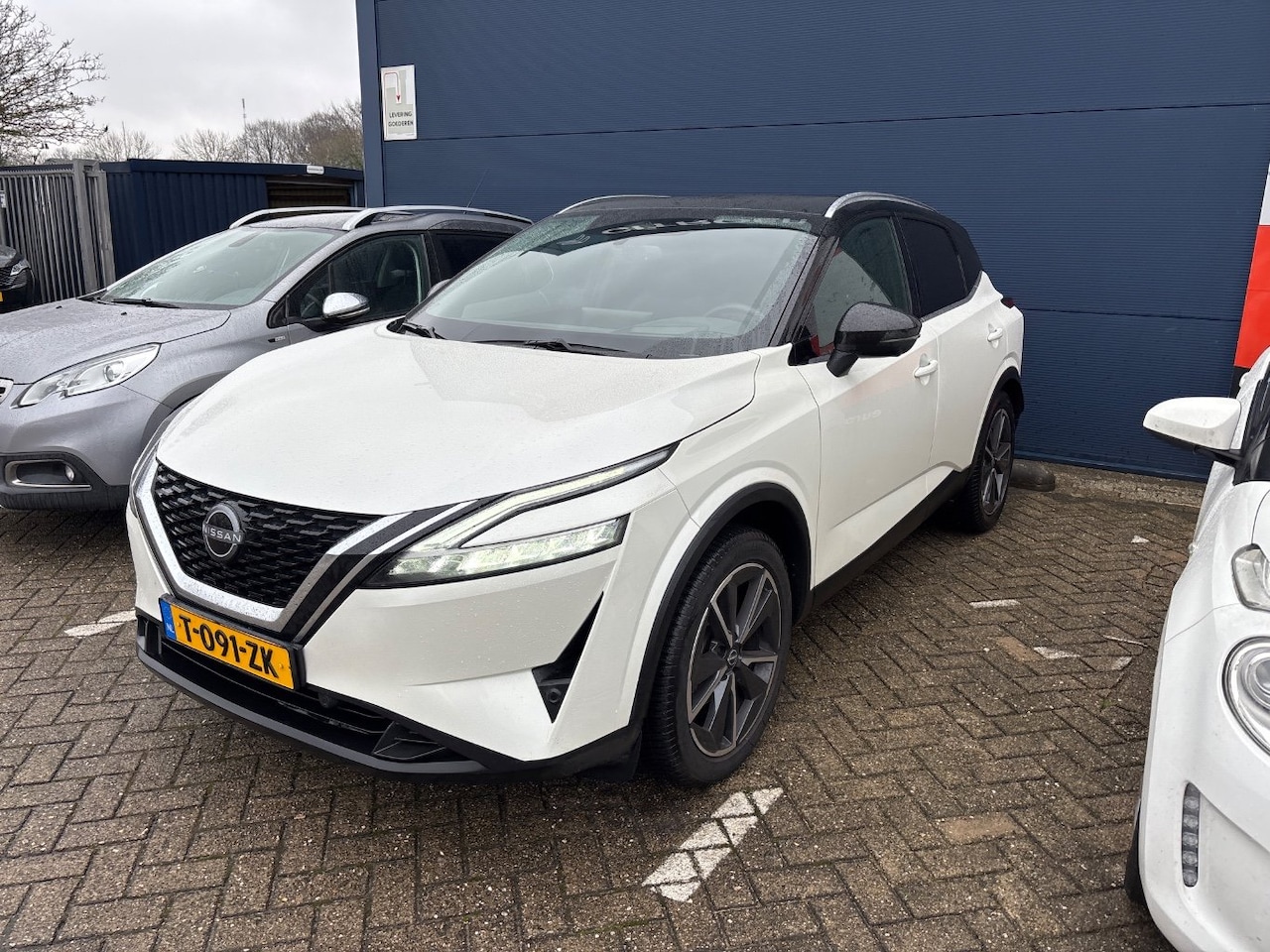 Nissan Qashqai - 1.3 MHEV Xtronic Tekna | Achterbank in delen neerklapbaar | Achteruitrijcamera | Afwijkend - AutoWereld.nl