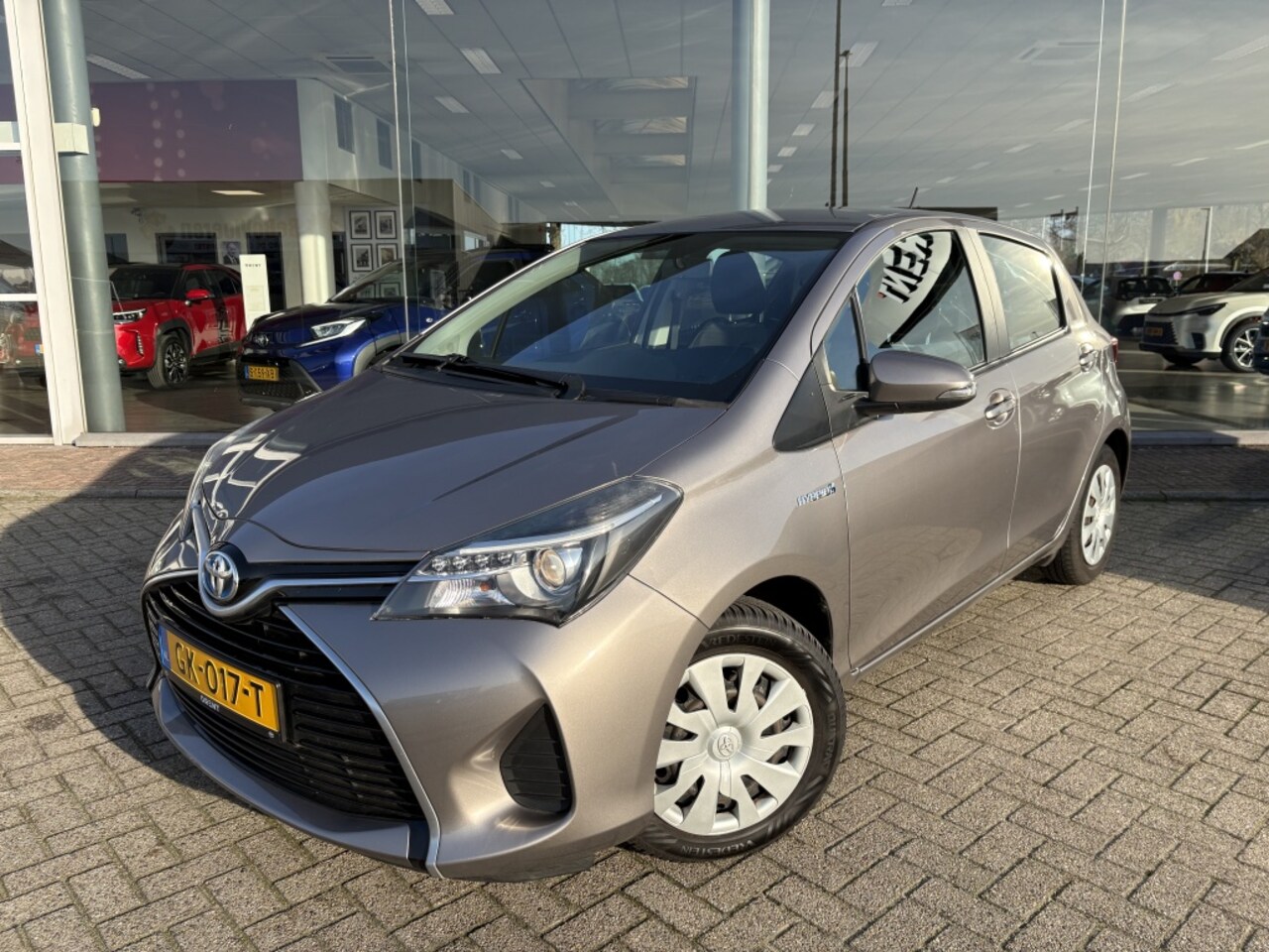 Toyota Yaris - 1.5 Hybrid Aspiration | Cruise control | Climate control | Navi - AutoWereld.nl