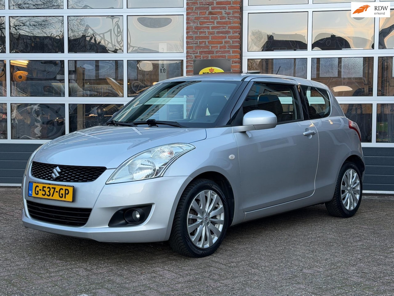 Suzuki Swift - 1.2 Comfort 1.2 Comfort , Airco/ECC, Stoelverw, schuifdak, cruise, keyless - AutoWereld.nl