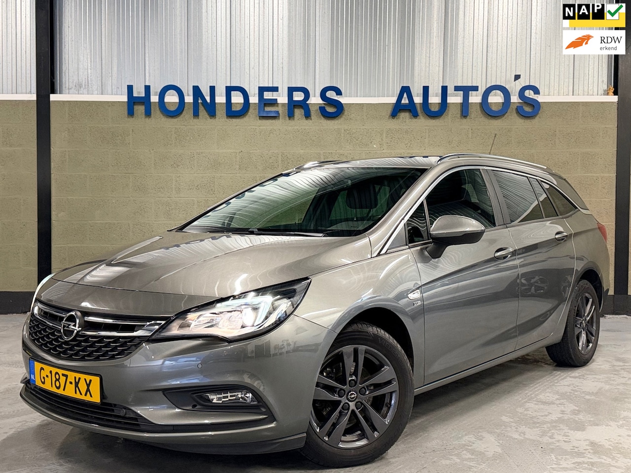 Opel Astra Sports Tourer - 1.0 Turbo 120 Jaar Edition I CARPLAP I 1E EIG I DEALER HISTORY I ORIG.NL NAP I NAVI I CLIM - AutoWereld.nl