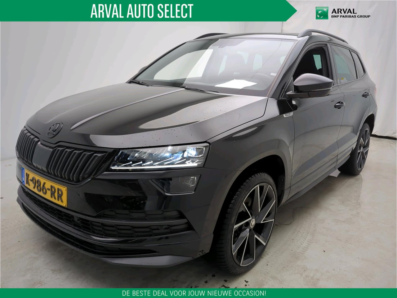 Skoda Karoq - 1.5 TSI 150pk ACT Sportline Business | Panoramadak | Stuur- Stoelverw. | Camera | PDC | Ke - AutoWereld.nl