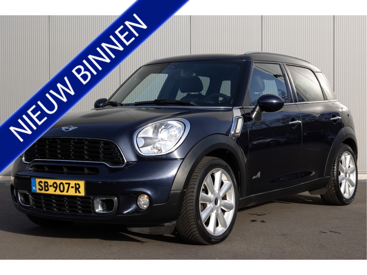 MINI Countryman - Mini 1.6 Cooper S ALL4 Chili | HARMAN | PANO | LEDER - AutoWereld.nl
