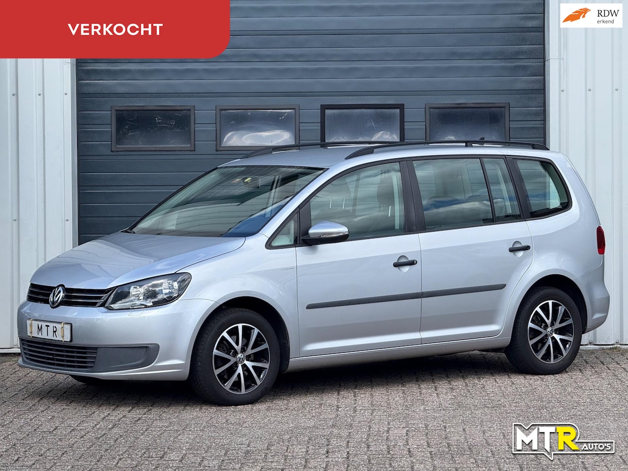 Volkswagen Touran - 1.4 TSI Highline 7p. AUT|KLIMA|NWE APK - AutoWereld.nl