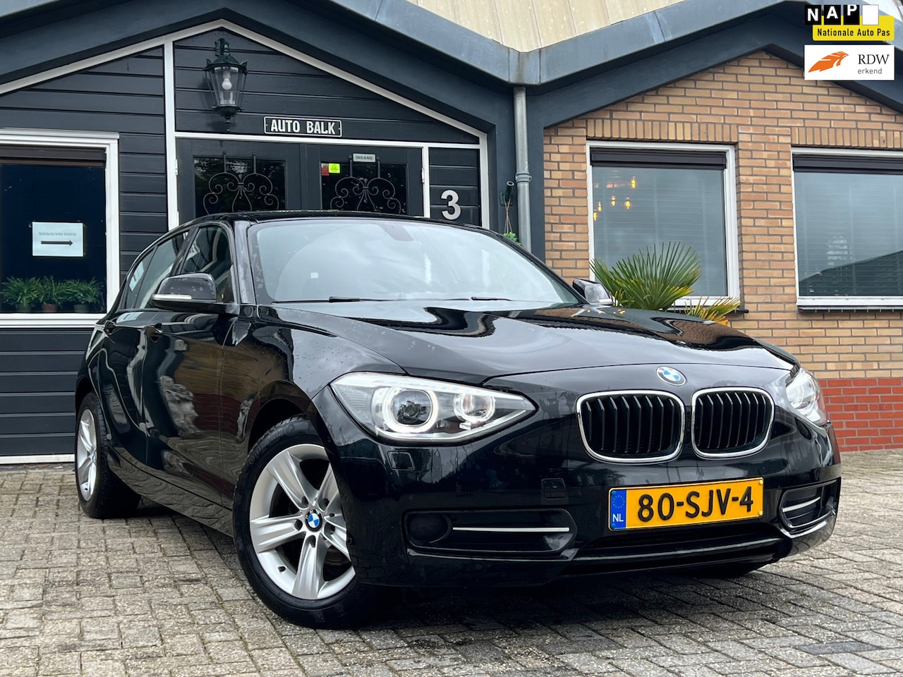 BMW 1-serie - 116i Sport | Cruise + Airco | - AutoWereld.nl