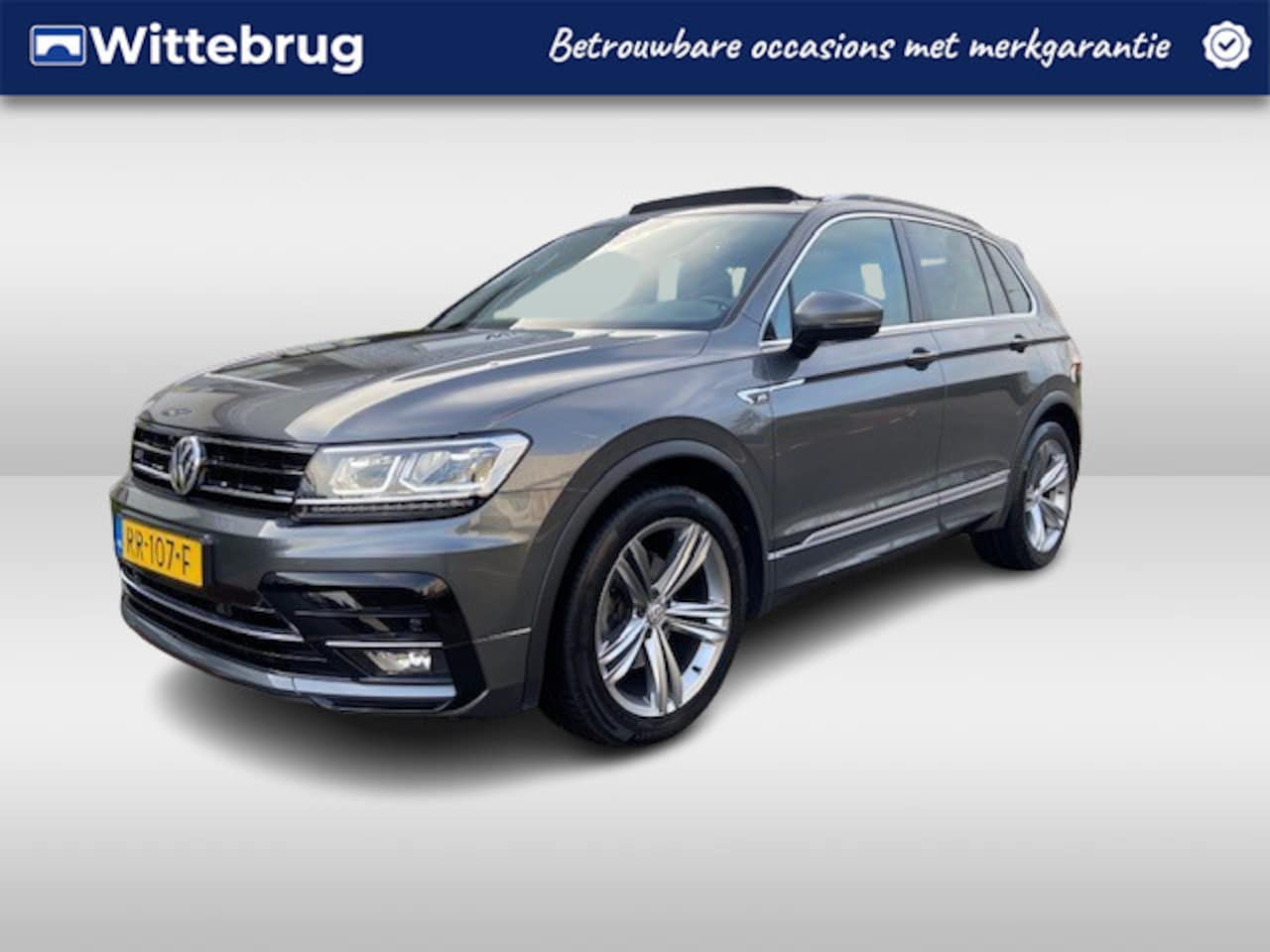 Volkswagen Tiguan - 1.4 TSI ACT Highline / R-Line Exterieur / NAVI / 19"LMV / PANODAK / Elektr. klep / Trekhaa - AutoWereld.nl