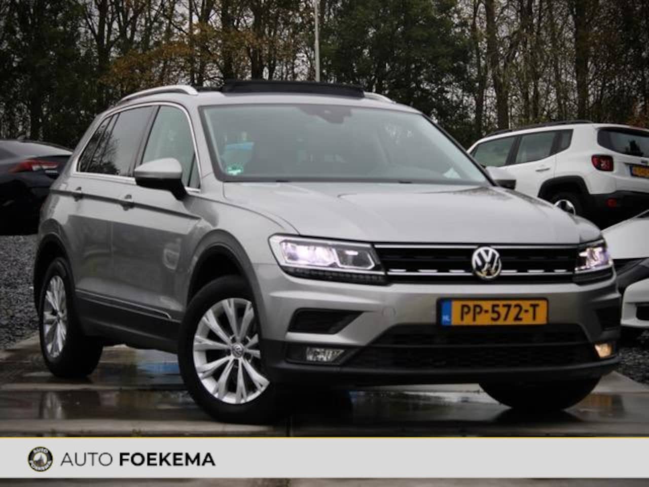 Volkswagen Tiguan - 2.0 TDI Comfortline Business Lane assist LED Pano - AutoWereld.nl