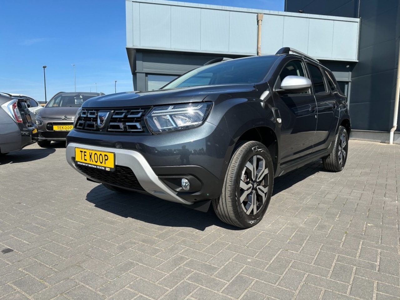 Dacia Duster - 1.0 TCe Prestige LPG Navi Camera - AutoWereld.nl