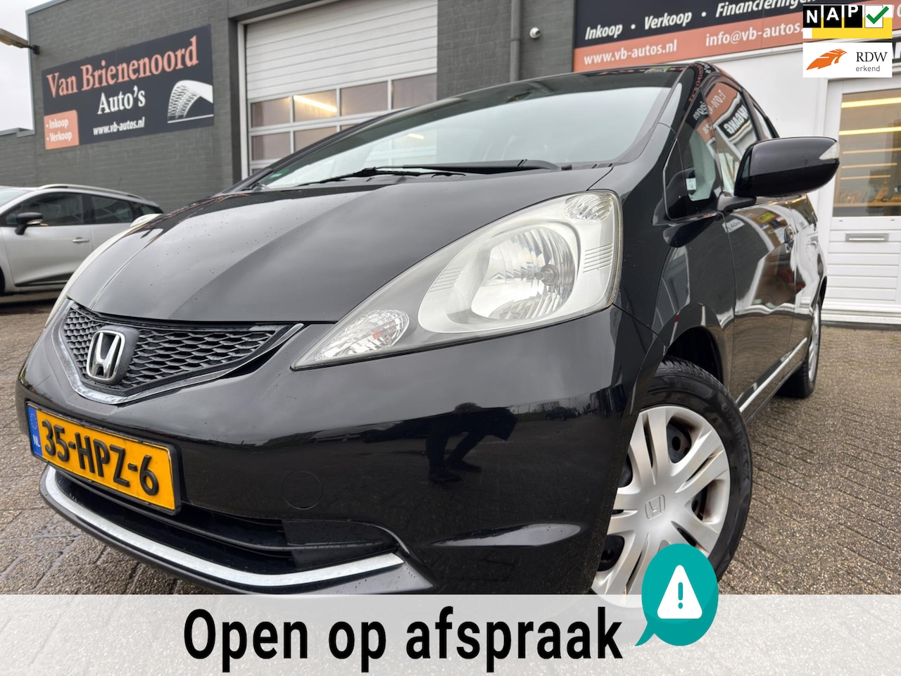 Honda Jazz - 1.4 Comfort 5 drs van 2de Eigenaar met airco en cruise controle - AutoWereld.nl