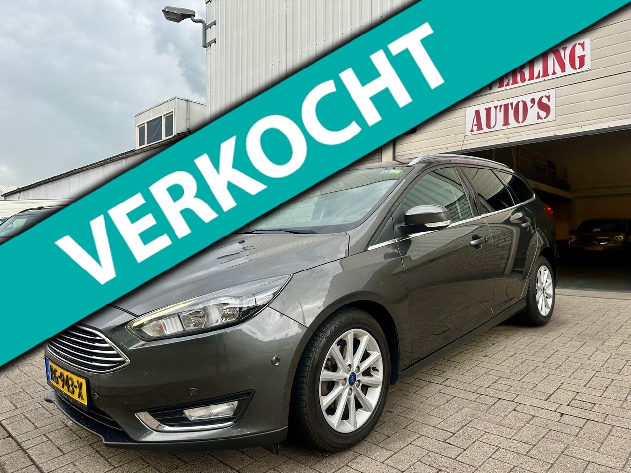 Ford Focus Wagon - 1.0 Titanium | Clima | Navi | Cruise | PDC - AutoWereld.nl