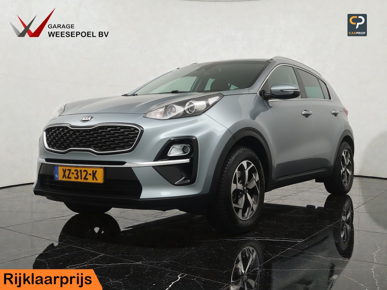 Kia Sportage - 1.6 GDI DynamicLine - Navigatie - Camera - Climate control - Cruise control - Trekhaak - 1 - AutoWereld.nl
