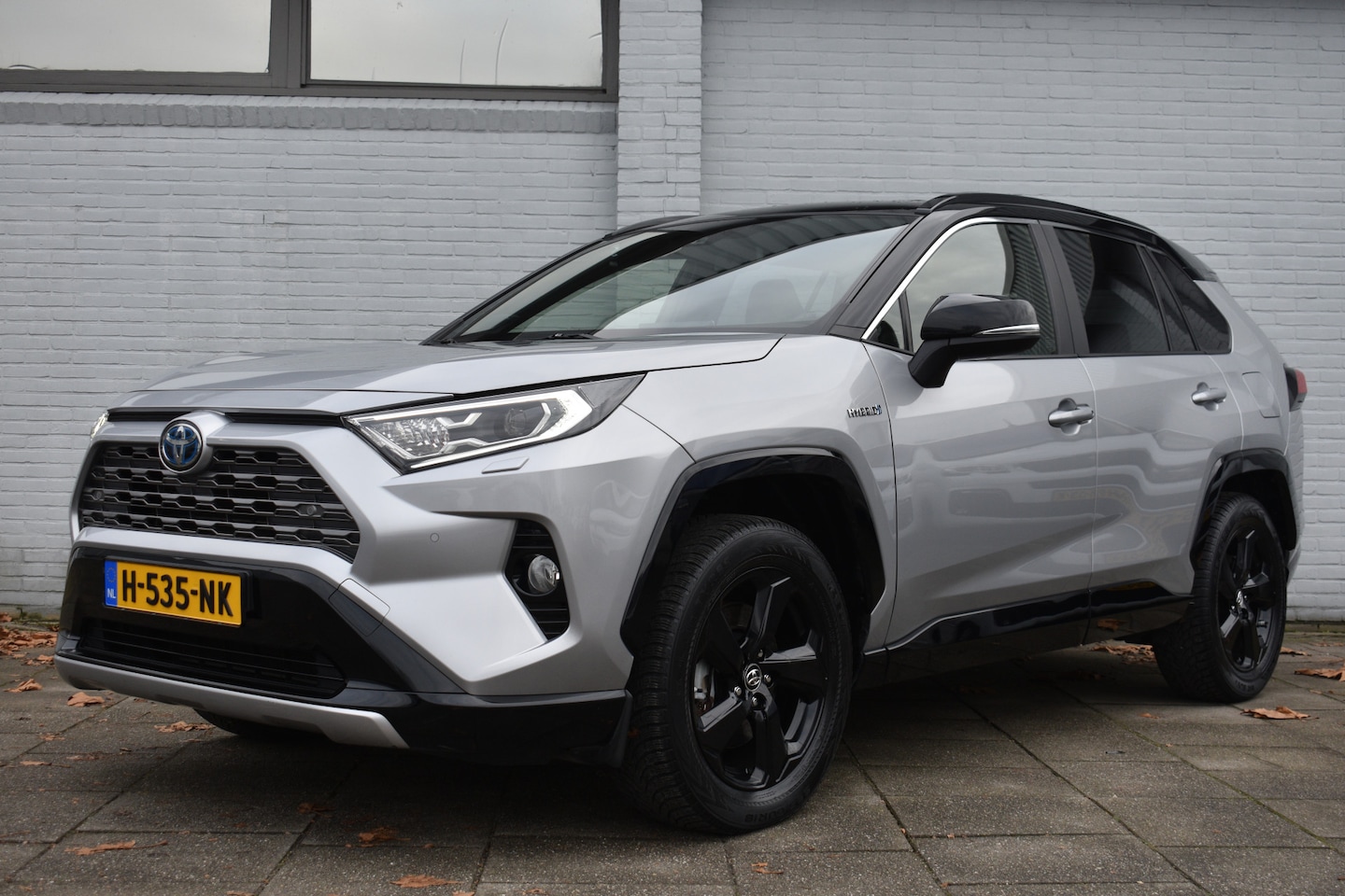 Toyota RAV4 - 2.5 Hybrid Bi-Tone Limited Automaat 179pk | Trekhaak | Stoel & Stuurverwarming | PDC | Ach - AutoWereld.nl