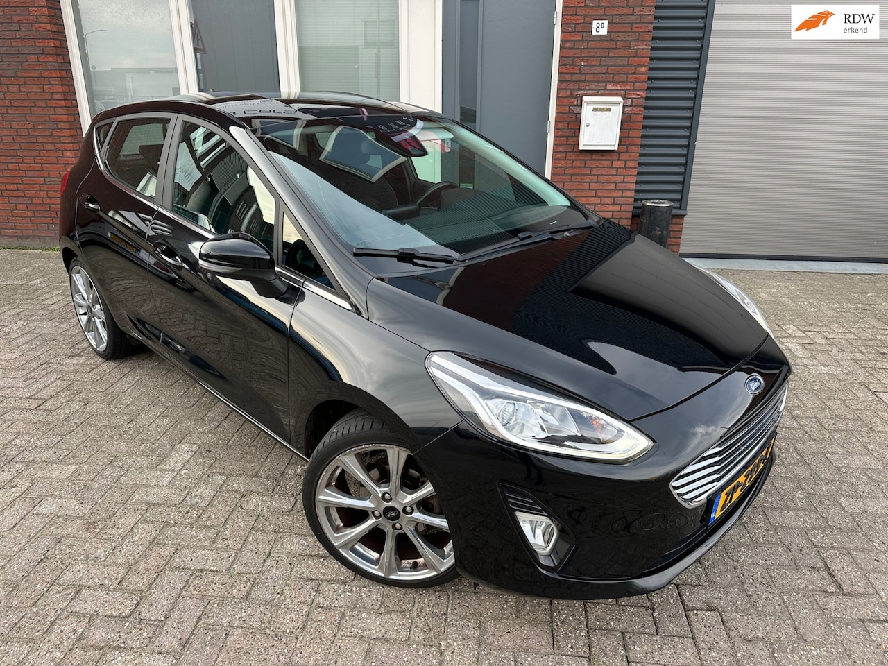 Ford Fiesta - 1.1 Titanium / PDC / 18inch / Carplay / Clima / 5DRS - AutoWereld.nl