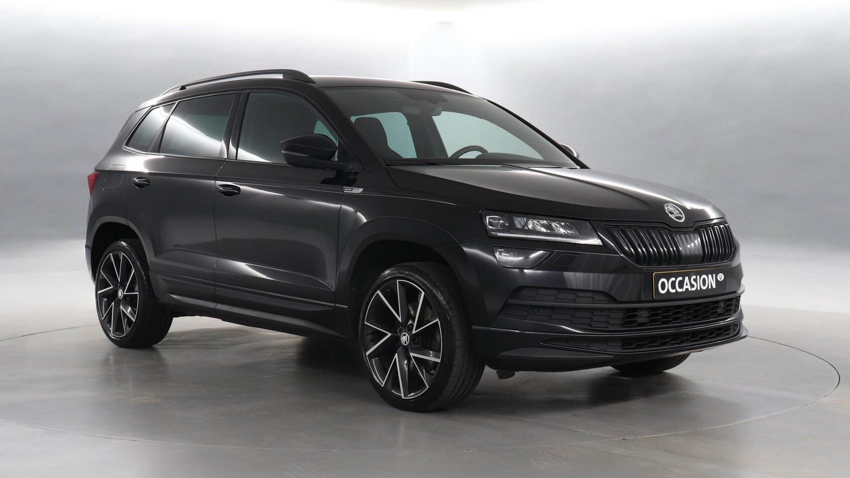 Skoda Karoq - 1.5 TSI ACT Sportline Business / Navigatie / Stoelverwarming / Camera / LED - AutoWereld.nl