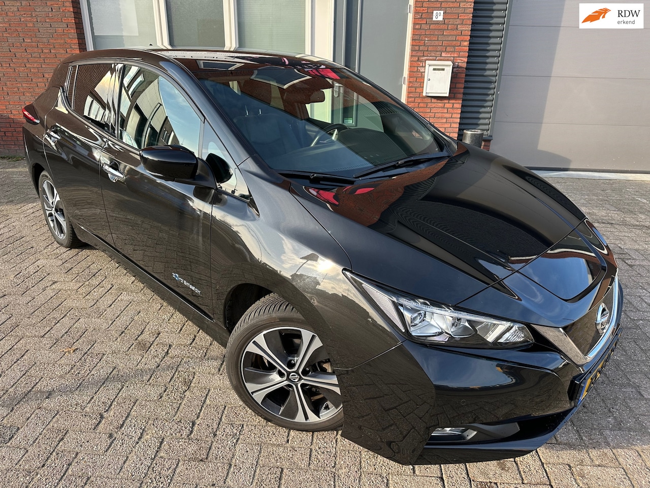 Nissan LEAF - Tekna 40 kWh / Navi / Bose / Camera / PDC / Leder - AutoWereld.nl