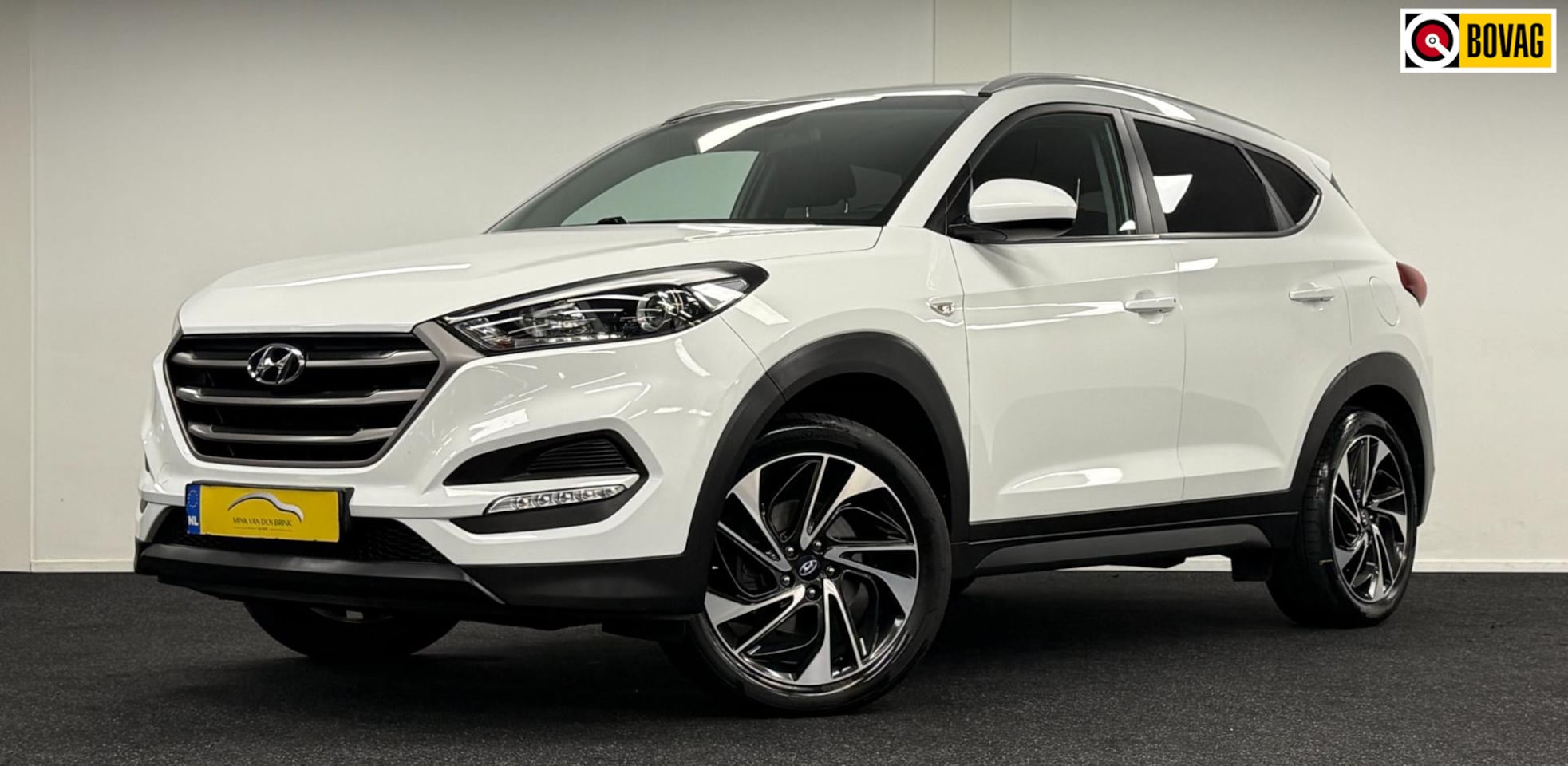 Hyundai Tucson - 1.6 GDi Premium*DealerOh*Trekhaak*Navi*Camera*Carplay*Stoelverw - AutoWereld.nl