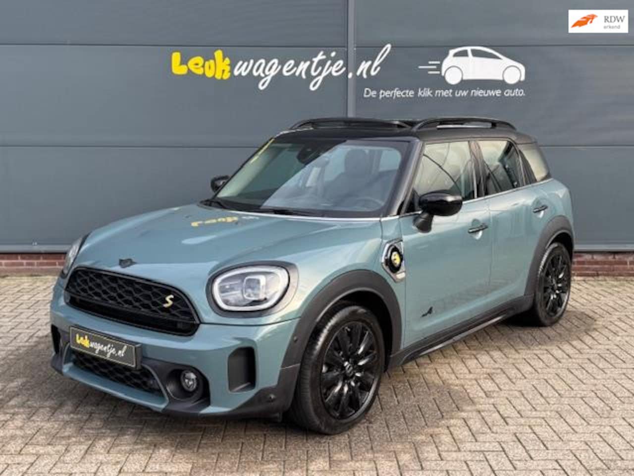 MINI Countryman - Mini 1.5 Cooper SE ALL4 Classic *pano *leer - AutoWereld.nl
