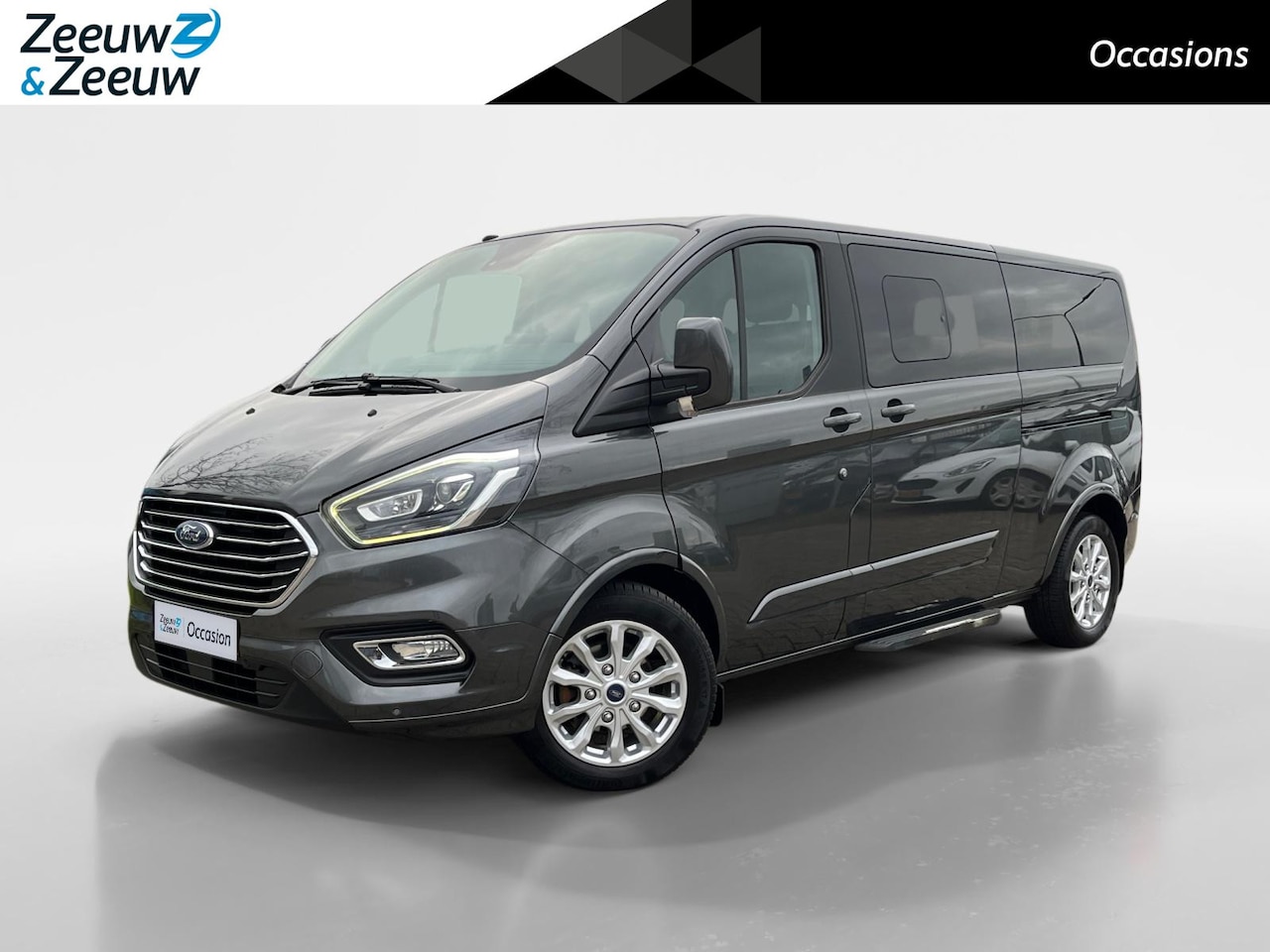 Ford Transit Custom Tourneo - 310 2.0 TDCI L2H1 Titanium 170 pk Automaat | 8 persoons | Lederen bekleding | Navigatiesys - AutoWereld.nl