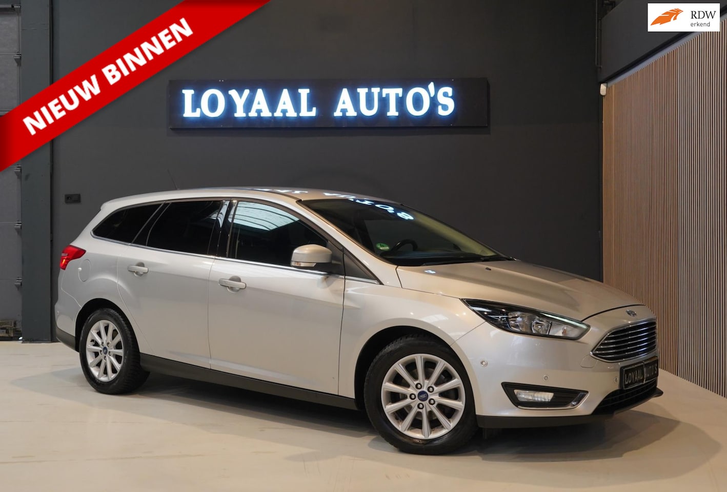Ford Focus Wagon - 1.0 Titanium | NAVI | AIRCO | CRUISE | TREKHAAK | PDC | NAP | APK. - AutoWereld.nl