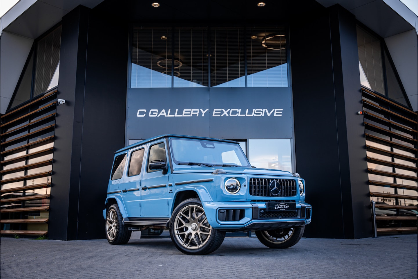 Mercedes-Benz G-klasse - AMG G63 Facelift - Carbon Pakket | Manufaktur China Blue | Panorama | Nappa leder - AutoWereld.nl