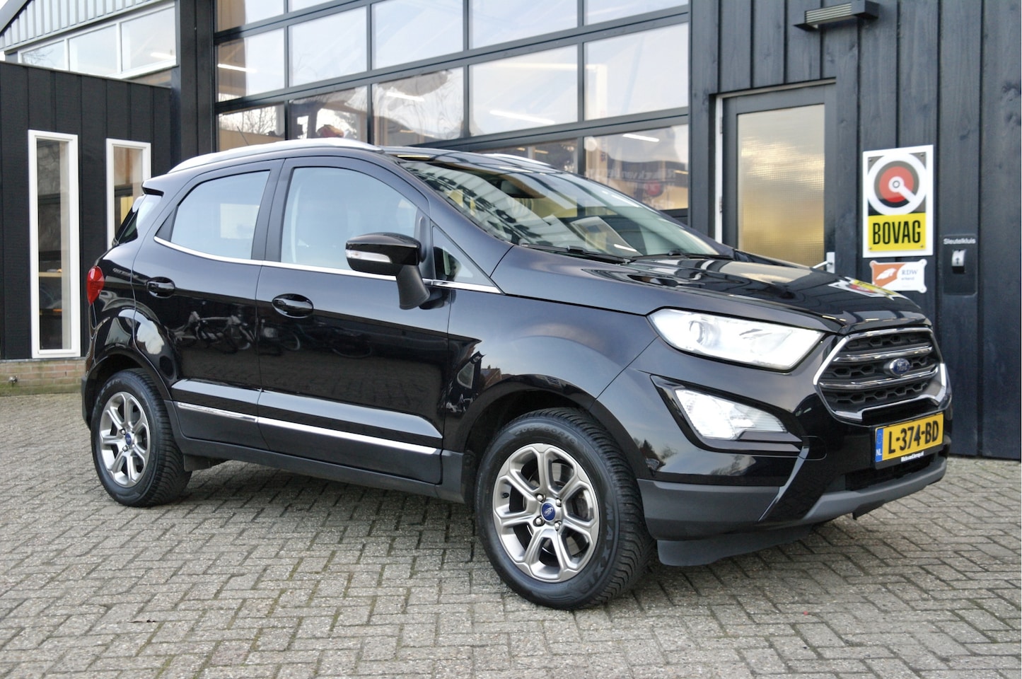 Ford EcoSport - 1.0 EcoBoost Titanium | Airco | Cruise | Trekhaak | Carplay - AutoWereld.nl
