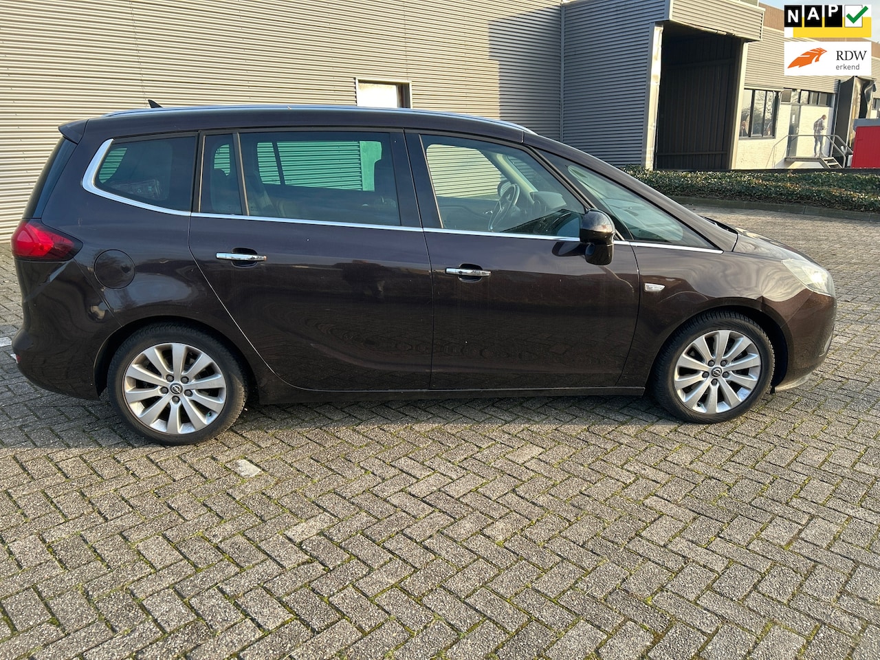 Opel Zafira Tourer - 1.4 Cosmo 7persoon. Lage kilometerstand volledig dealer onderhouden - AutoWereld.nl
