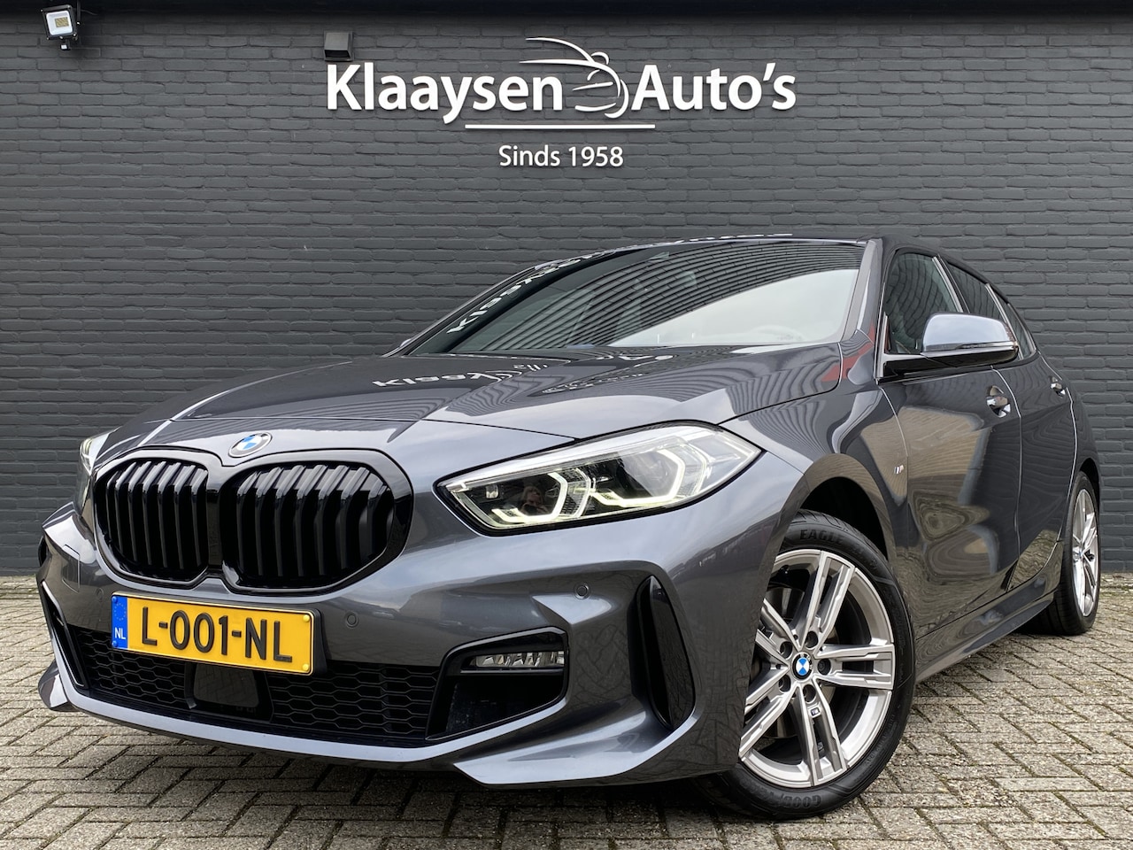 BMW 1-serie - 116i M Sport | 1e eigenaar | dealer onderhouden | bruin leder sportstoelen | navigatie | s - AutoWereld.nl
