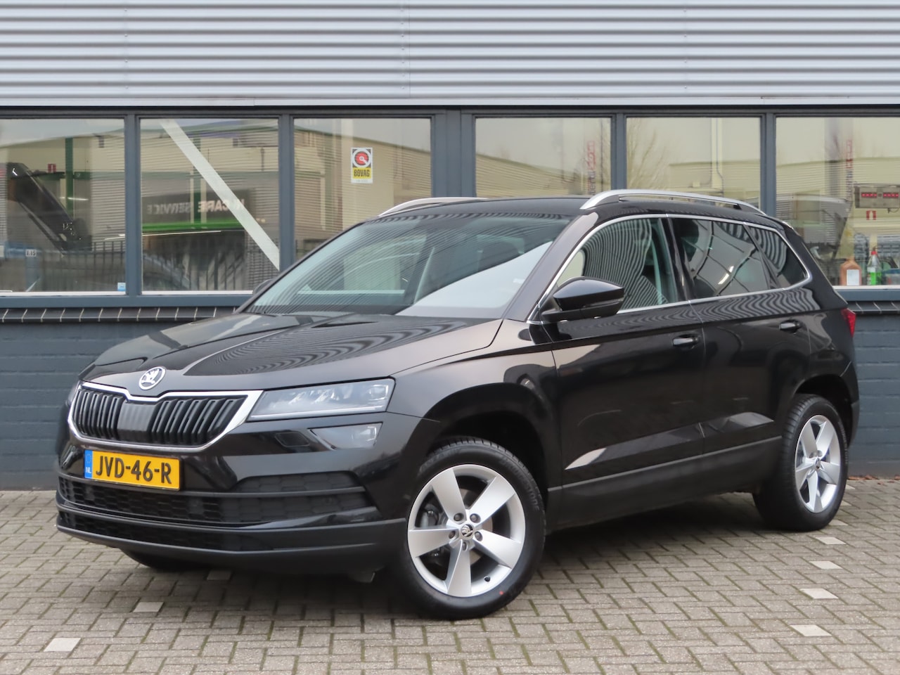 Skoda Karoq - 1.5 TSI ACT Style | camera | achterklep elektrisch | adaptive cruise | navi | stoelverwar - AutoWereld.nl