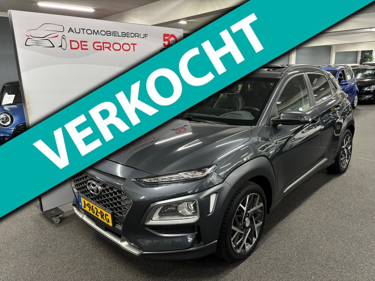 Hyundai Kona - 1.6 GDI HEV Premium Sky/ Nederlandse auto/ Eerste eigenaar/ Panoramadak/ LMV/ Lederen bekl - AutoWereld.nl