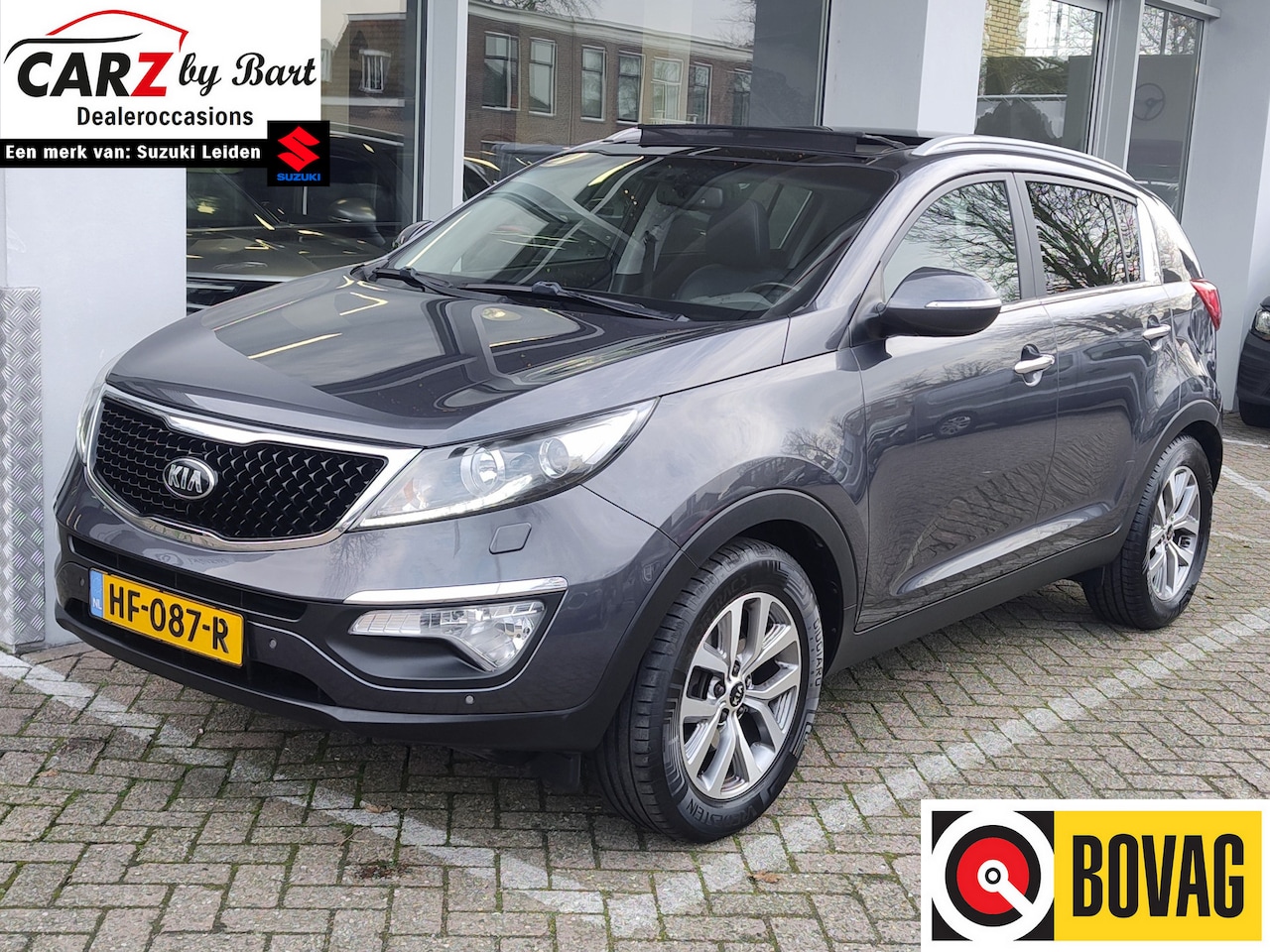 Kia Sportage - 1.6 GDI X-TREME EXECUTIVELINE Stuurverwarming | Open dak | Keyless | Xenon - AutoWereld.nl