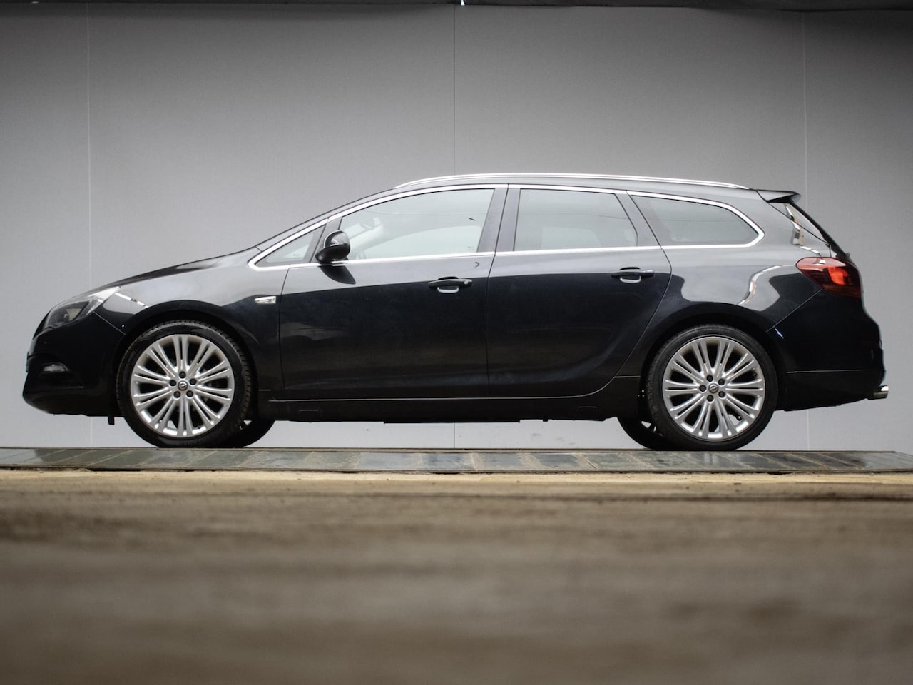 Opel Astra Sports Tourer - 1.4 Turbo GT Sport NAVI,CLIMATE,CRUISE,GETINT,BLUETOOTH,PARROT,SPORTSTOELEN,LM VELGEN,NETT - AutoWereld.nl