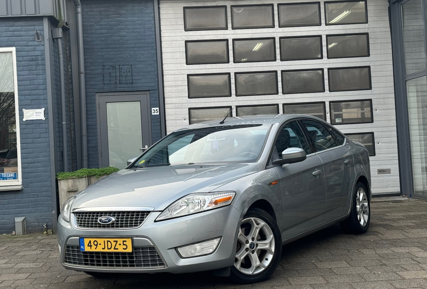 Ford Mondeo - 2.0-16V Titanium | Clima | Navi | PDC V+A - AutoWereld.nl