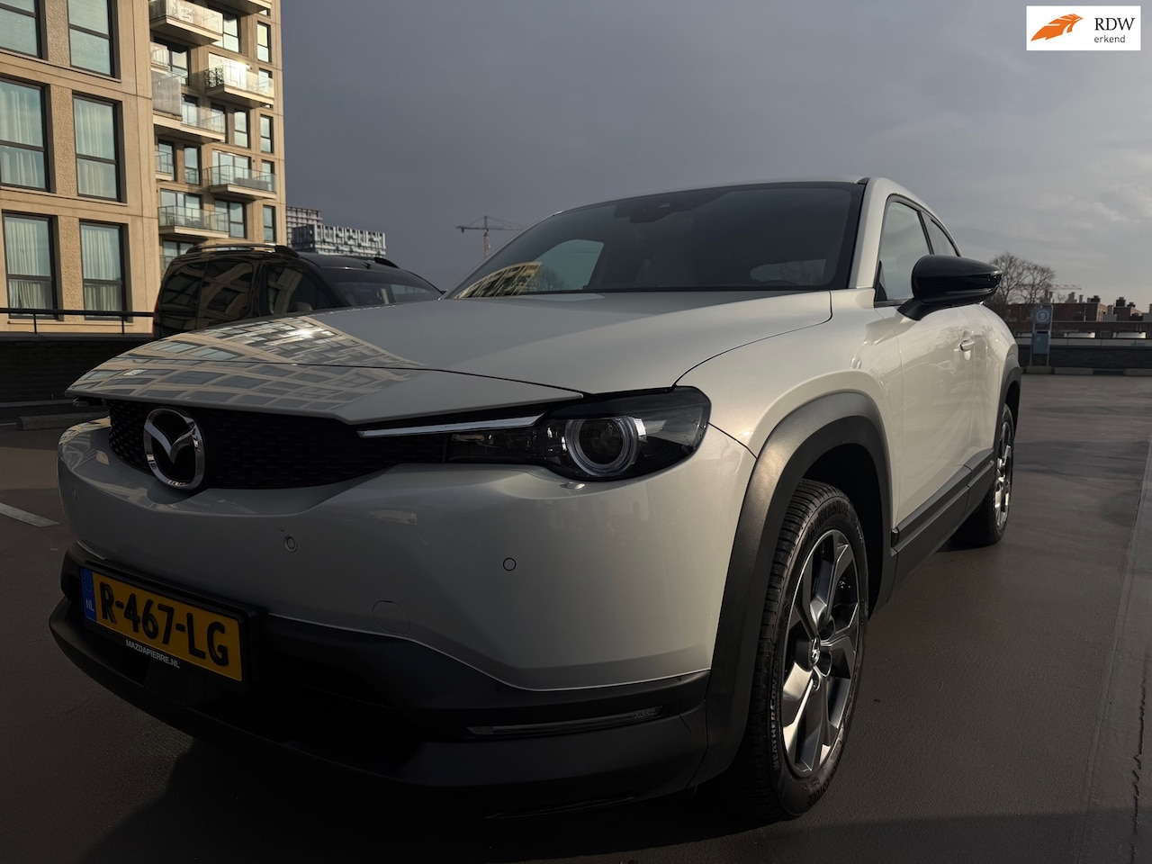 Mazda MX-30 - E-SkyActiv 145 First Edition 36 kWh Vol Optie Carplay Camera Adaptief Cruise Memory Stoele - AutoWereld.nl