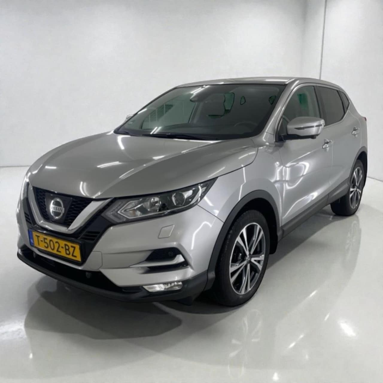 Nissan Qashqai - 1.2 Tekna + Trekhaak/ LED/ NAVI/ St.verwarming - AutoWereld.nl