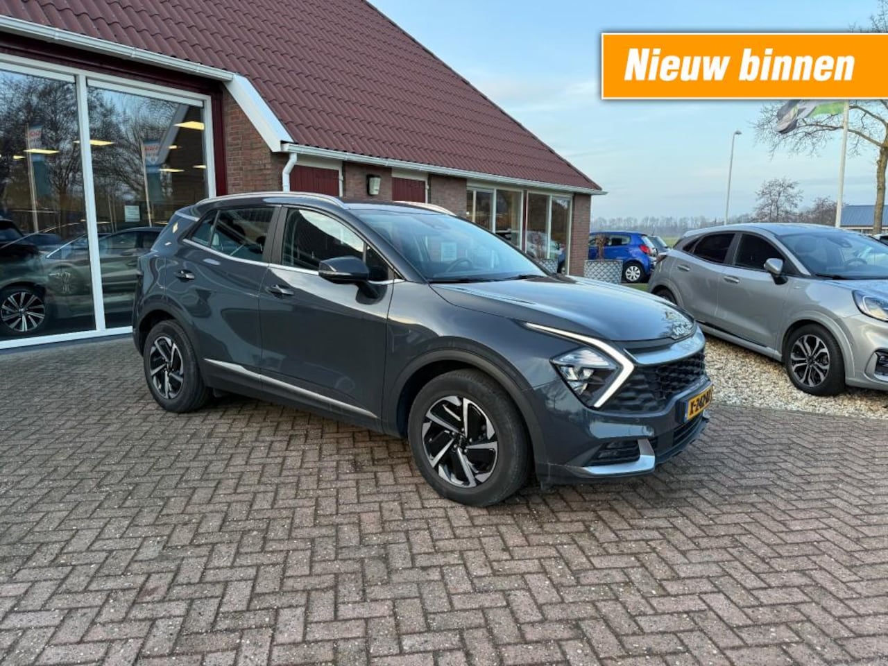 Kia Sportage - 1.6 T-GDI HYBID DYNAMIC LINE AUTOMAAT! - AutoWereld.nl