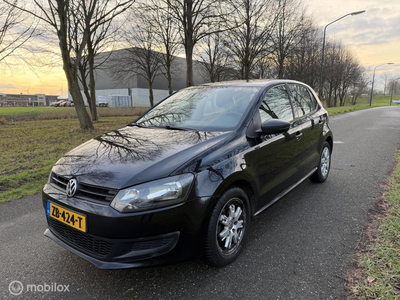Volkswagen Polo - 1.2-12V Trendline*NEW APK 02/27*SCHERM*AIRCO - AutoWereld.nl